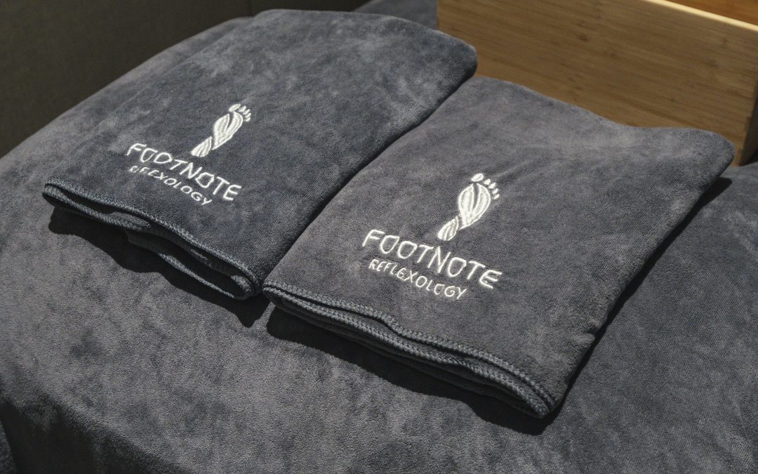 FootNote Reflexology towels on a body massage bed at PLQ Mall